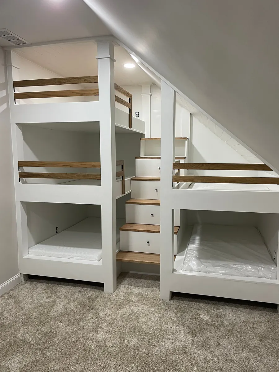 Built-in bunk beds with drawer stairs